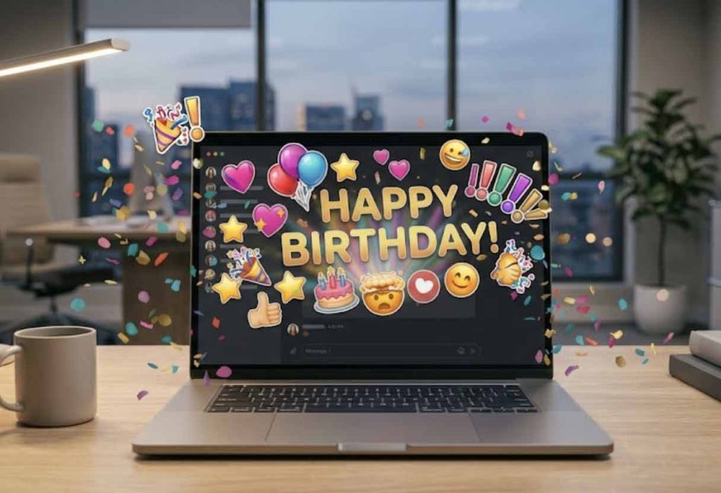 A laptop screen displaying a simple 'Happy Birthday' message decorated with festive emojis and digital confetti.